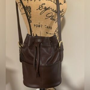 Vintage 90's Coach Brown Berkeley
Drawstring Bucket Crossbod Bag No. F5C-4151.